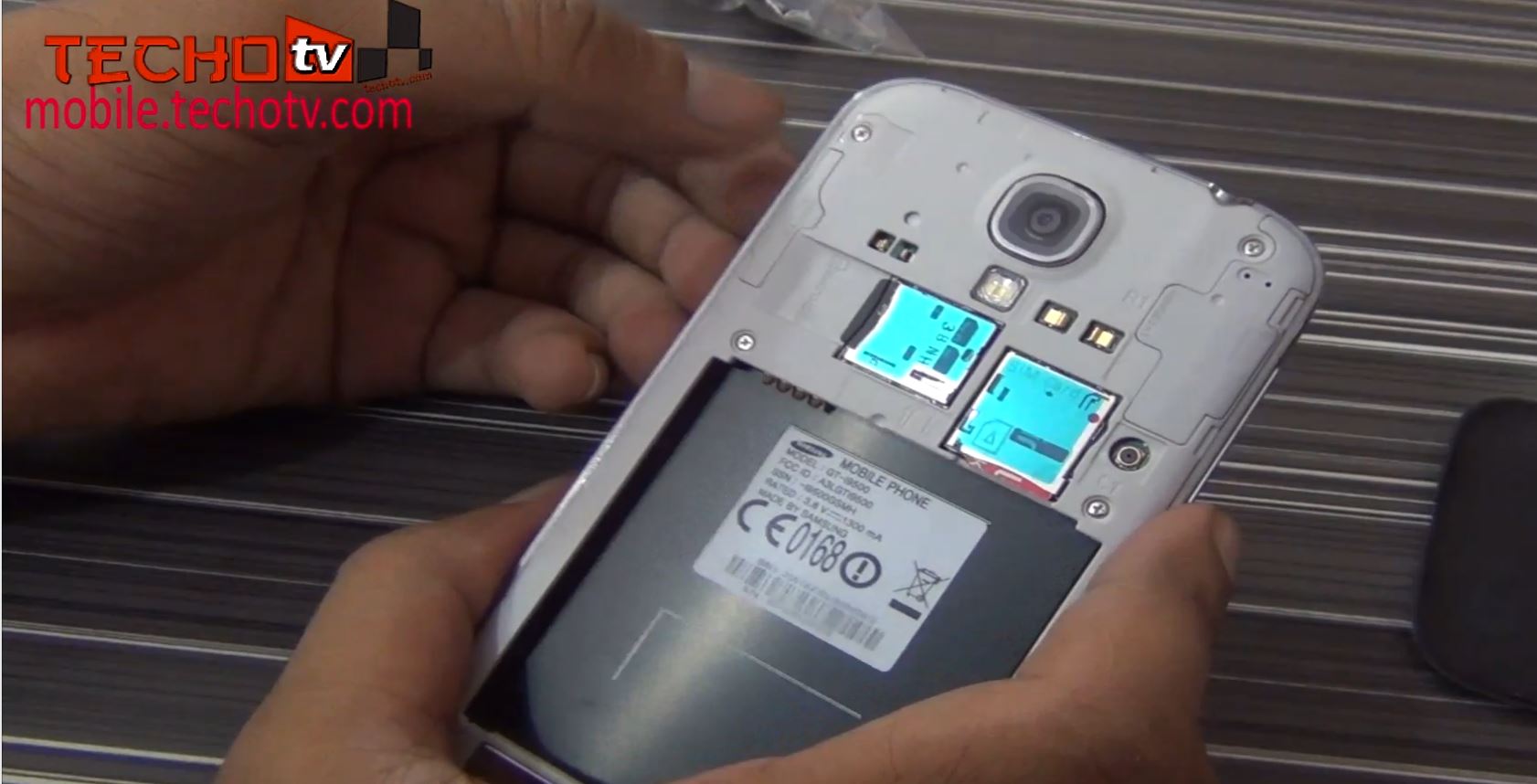 How to insert SIM Card into Samsung Galaxy S4 - Video